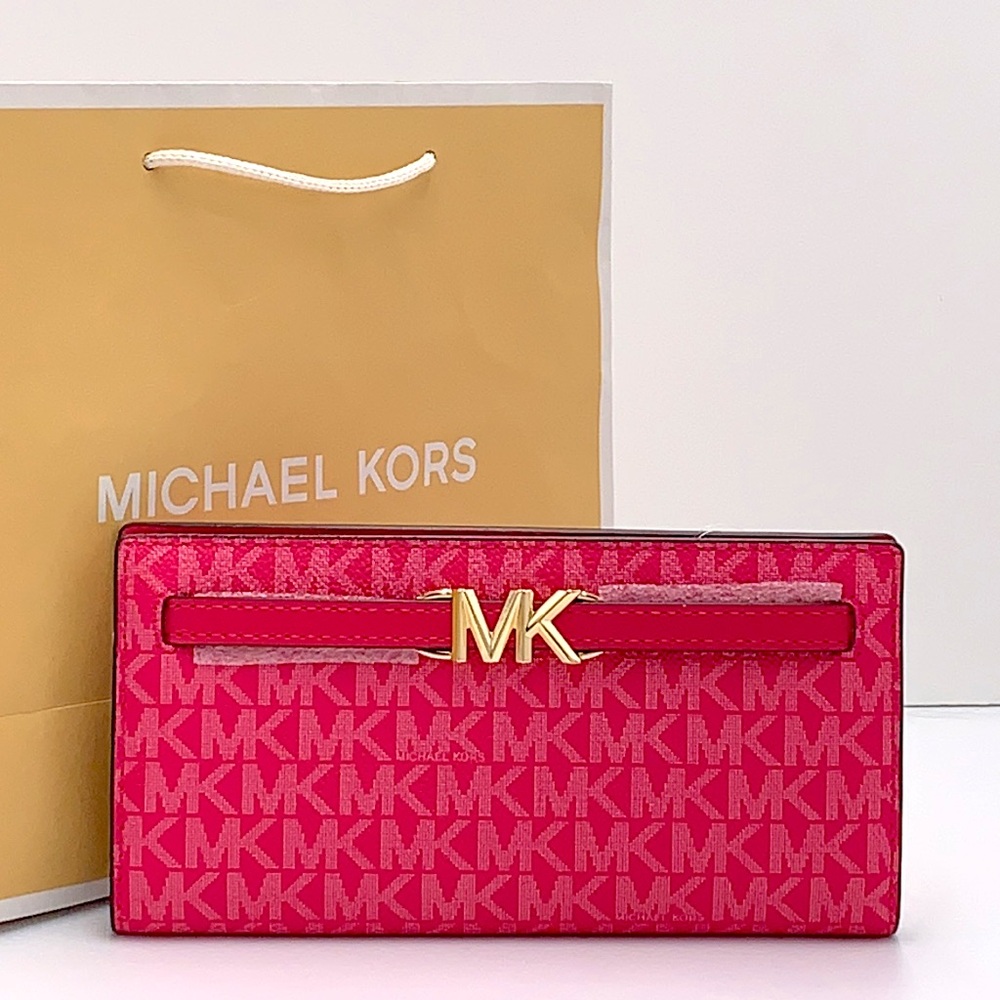 MICHAEL KORS Reed Large
Snap Signature Wallet Electric Pink color